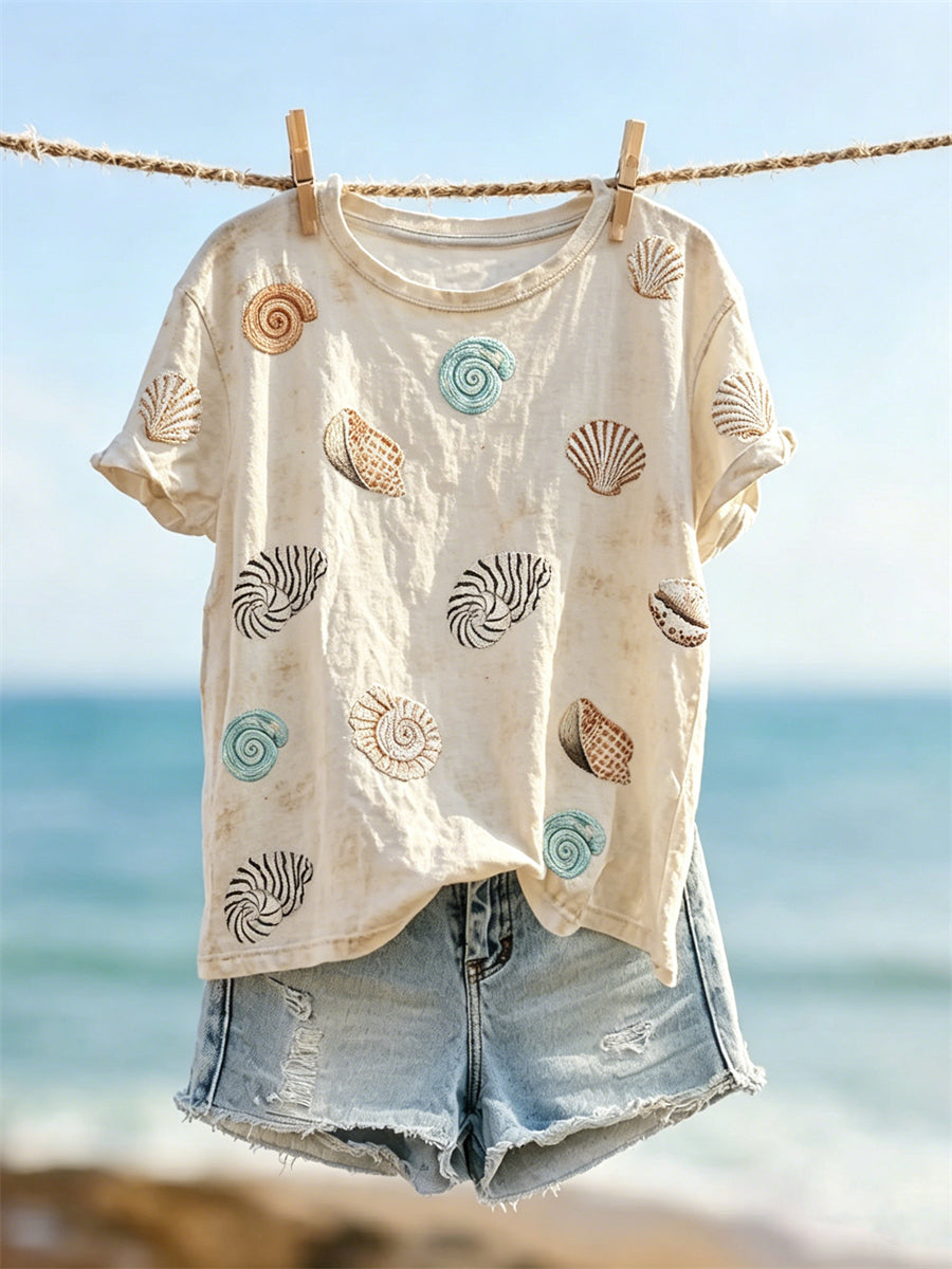 T-shirt femme à manches courtes orné d’un imprimé coquillages et coquilles de mer