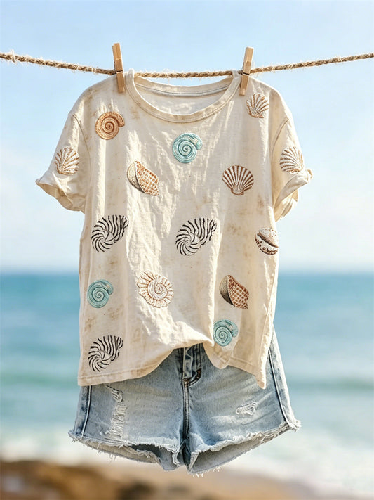 T-shirt femme à manches courtes orné d’un imprimé coquillages et coquilles de mer