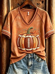 T-shirt a maniche corte con stampa autunnale ispirata al calcio femminile e motivi a zucca
