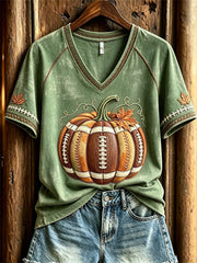 T-shirt a maniche corte con stampa autunnale ispirata al calcio femminile e motivi a zucca