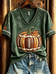 T-shirt a maniche corte con stampa autunnale ispirata al calcio femminile e motivi a zucca